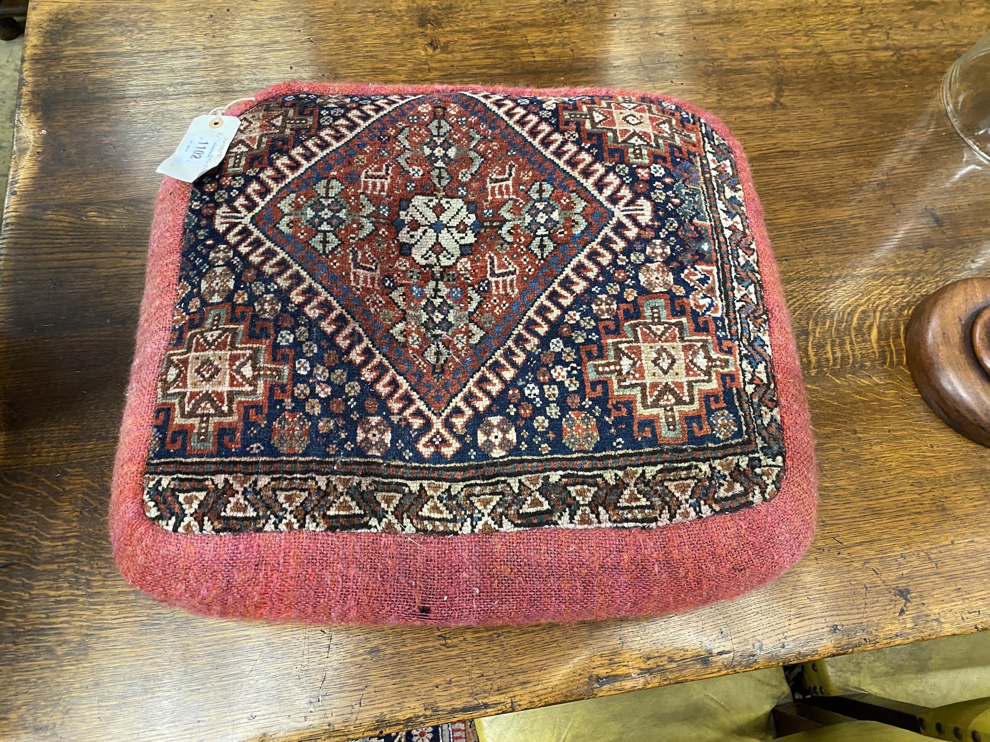 A Kashgai bag face cushion, 65 x 53cm